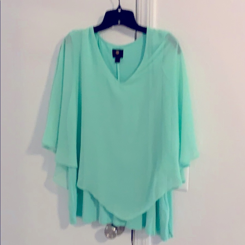 JM Collections tunic top 1X “angle cape” style.